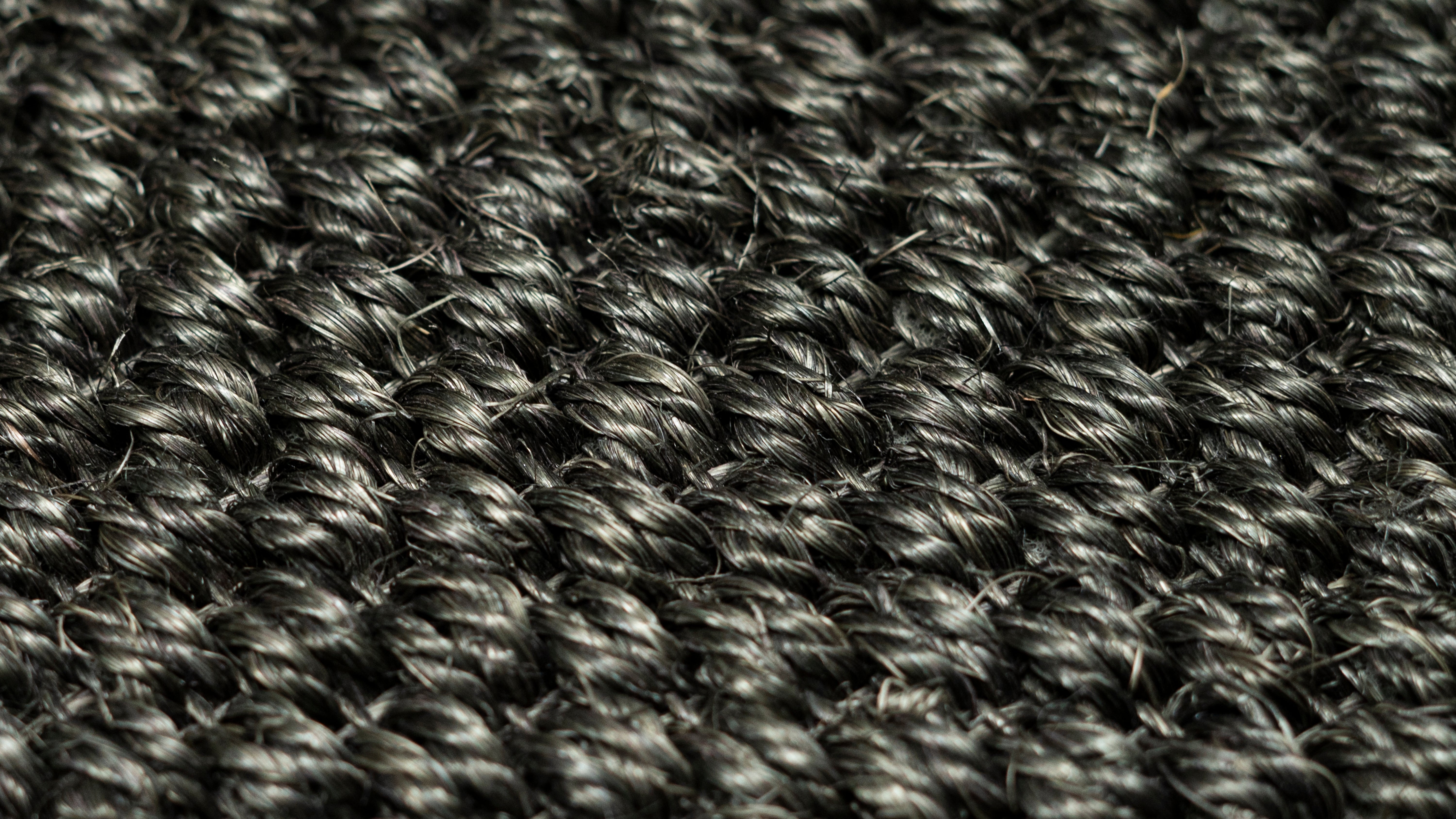 Artisan weaving sisal car mat in Alleppey, Kerala