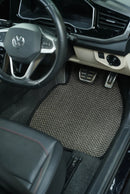 Close-up of Nerova Kari Tiger Eye sisal mat texture — deep charcoal medium-weave natural sisal, custom car mat India
