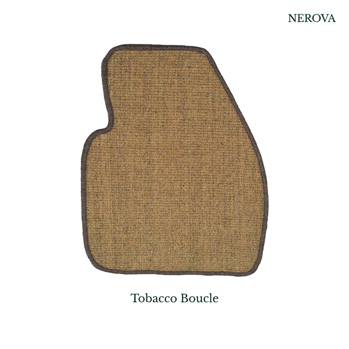 Nerova Tobacco bouclé sisal car mat in driver footwell — warm brown flat-weave natural sisal, premium car mat India